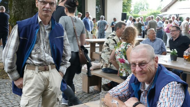 Genkinger employees celebrating the summer festival with a cozy get-together and delicious food at the beautiful and historic Remontedepot in Heroldstatt.